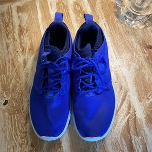 Blue Nike gym shoes. Worn once.